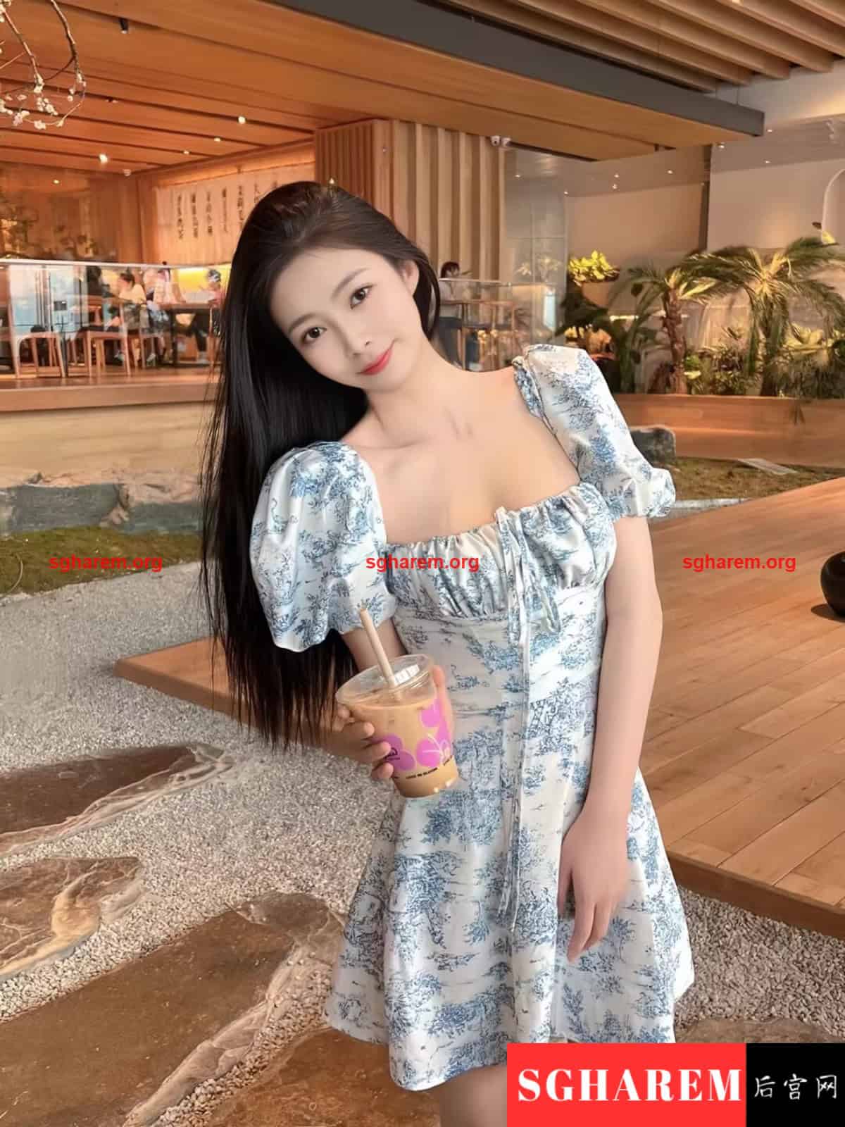 Luxury Singapore companion relaxing in suite